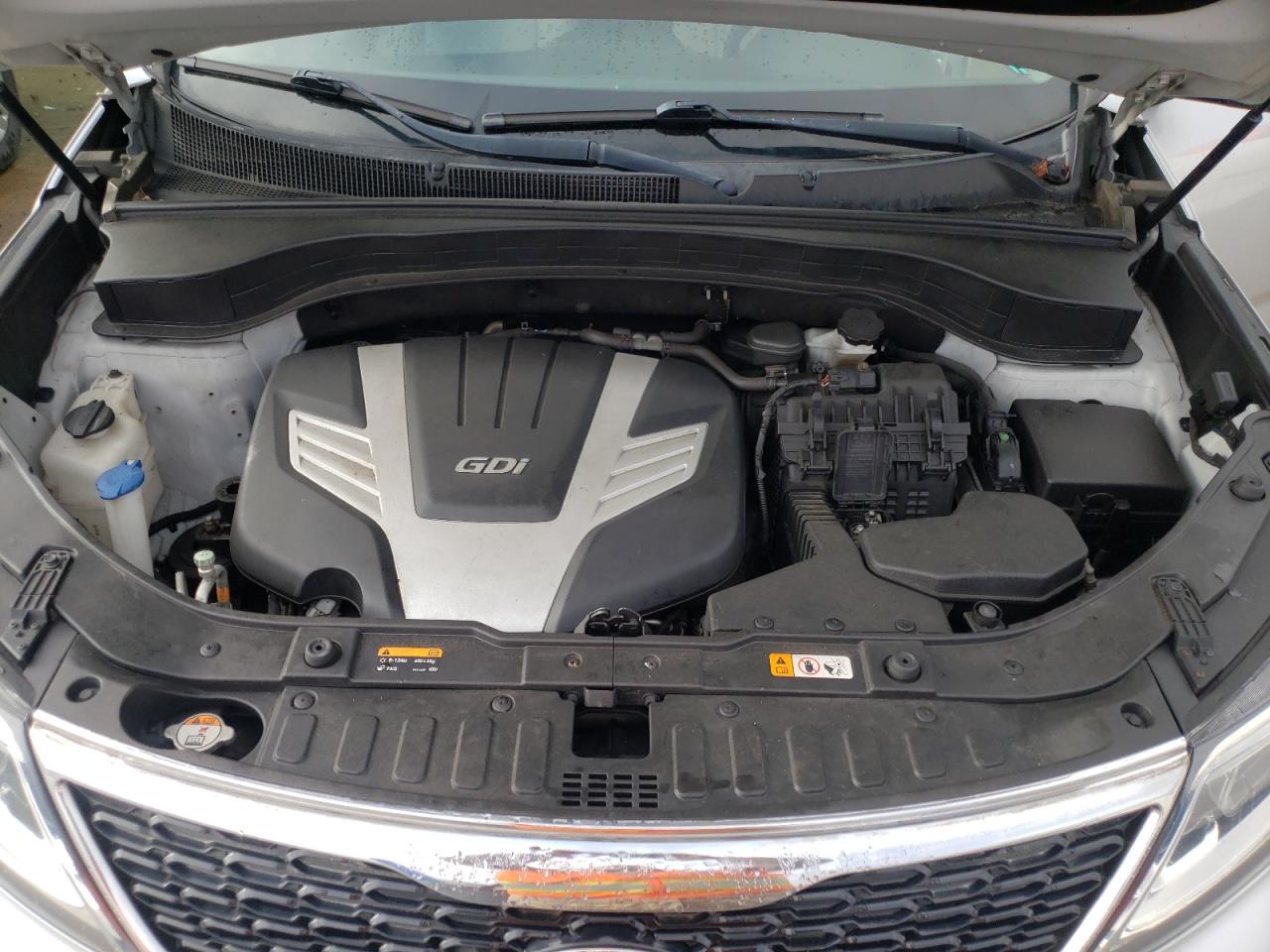 Photo 7 from auction – 2014 KIA SORENTO LX with VIN 5XYKTDA73EG524344