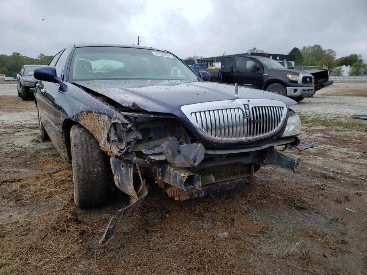 Photo 9 from auction – 2004 LINCOLN TOWN CAR E with VIN 1LNHM81W64Y625840