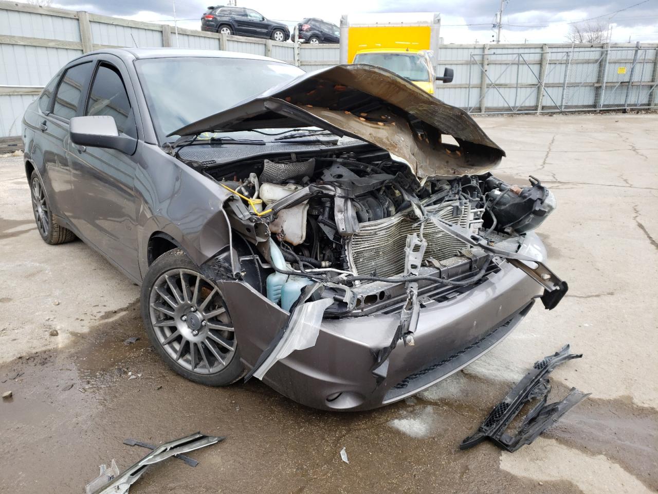 FORD FOCUS SES 2011 with VIN 1FAHP3GN3BW130913 - Photo from auction