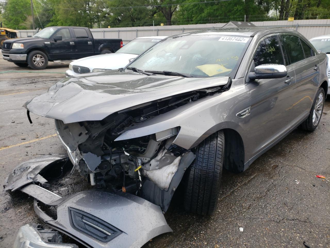 Photo 2 from auction – 2014 FORD TAURUS with VIN 1FAHP2F8XEG177506