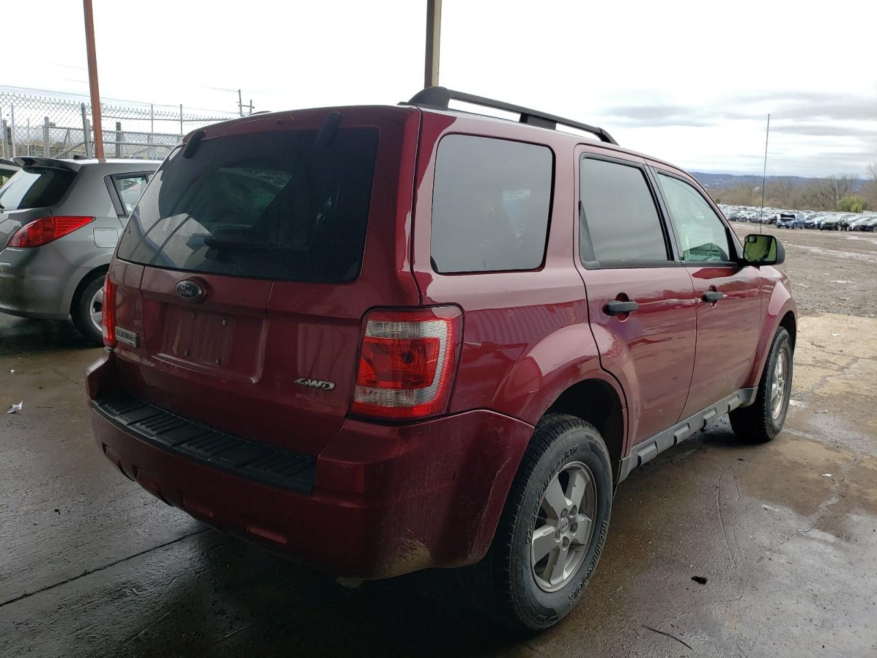 Photo 4 from auction – 2009 FORD ESCAPE with VIN 1FMCU93G99KA63111