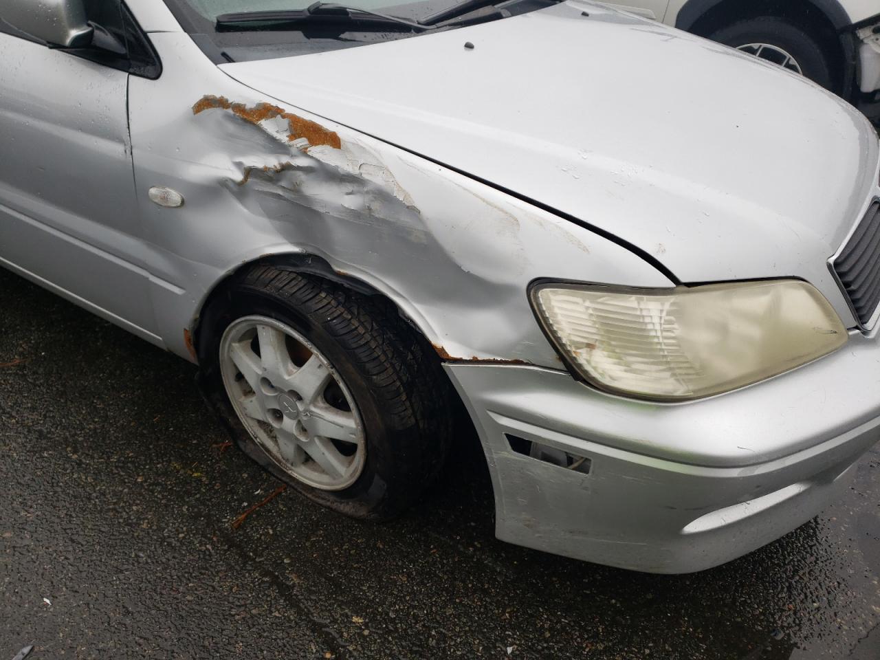 Photo 9 from auction – 2002 MITSUBISHI LANCER LS with VIN JA3AJ36E02U019860