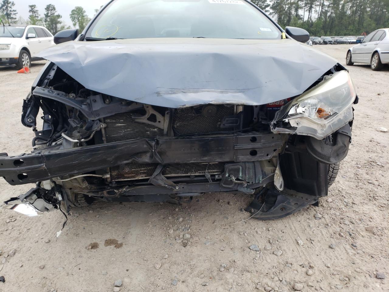 Photo 9 from auction – 2015 TOYOTA COROLLA L with VIN 5YFBURHE4FP201173