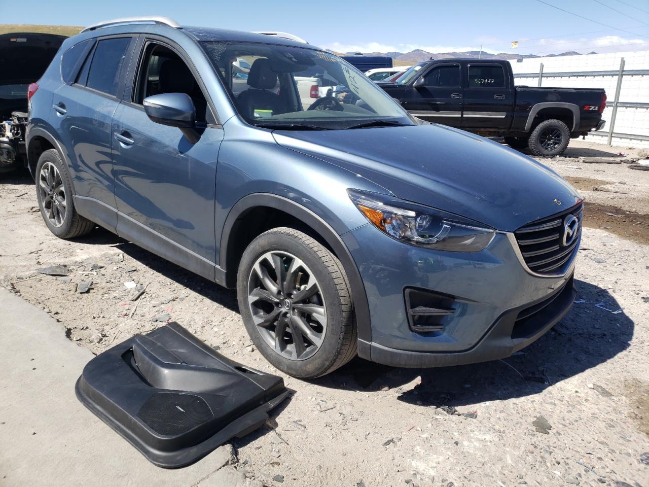 MAZDA CX-5 GT 2016 with VIN JM3KE4DY8G0674044 - Photo from auction