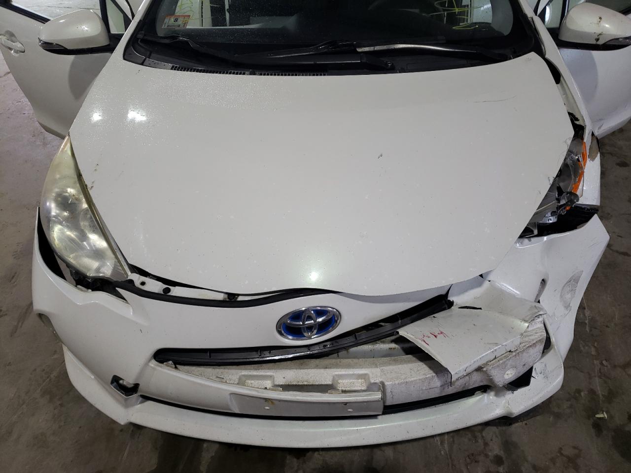 Photo 7 from auction – 2012 TOYOTA PRIUS C with VIN JTDKDTB31C1510104