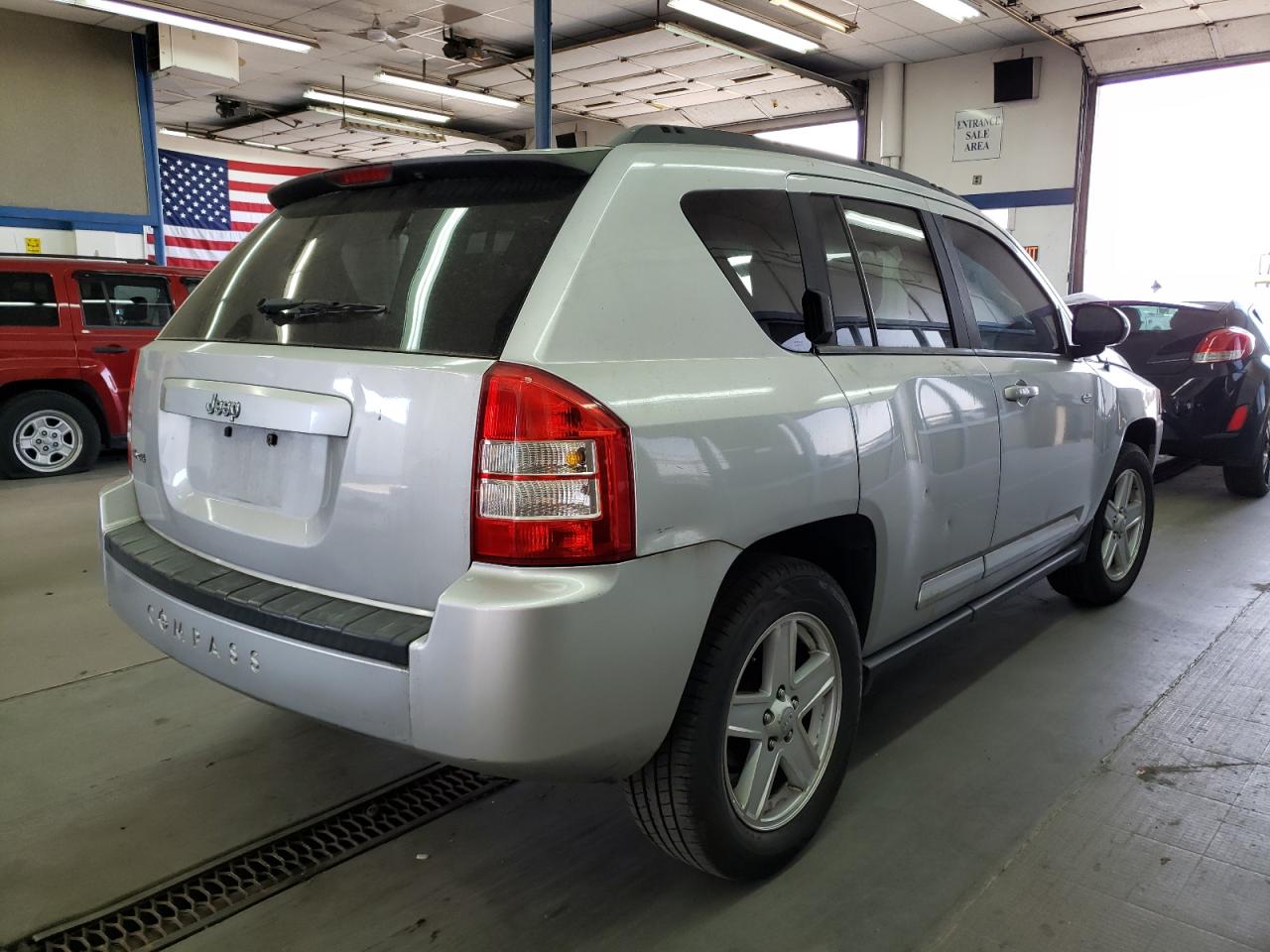 Photo 4 from auction – 2010 JEEP COMPASS SP with VIN 1J4NF4FB4AD564498