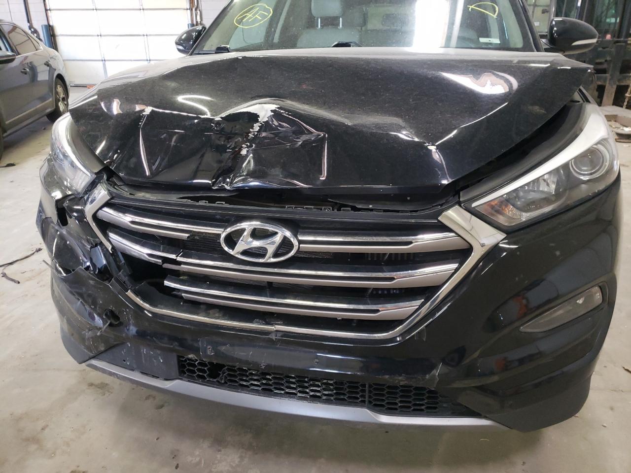 Photo 9 from auction – 2016 HYUNDAI TUCSON LIM with VIN KM8J3CA23GU206134