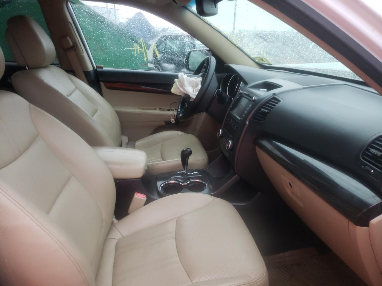 Photo 5 from auction – 2012 KIA SORENTO EX with VIN 5XYKUDA24CG305410