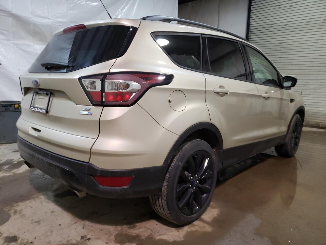 Photo 4 from auction – 2017 FORD ESCAPE SE with VIN 1FMCU9GD4HUB72143