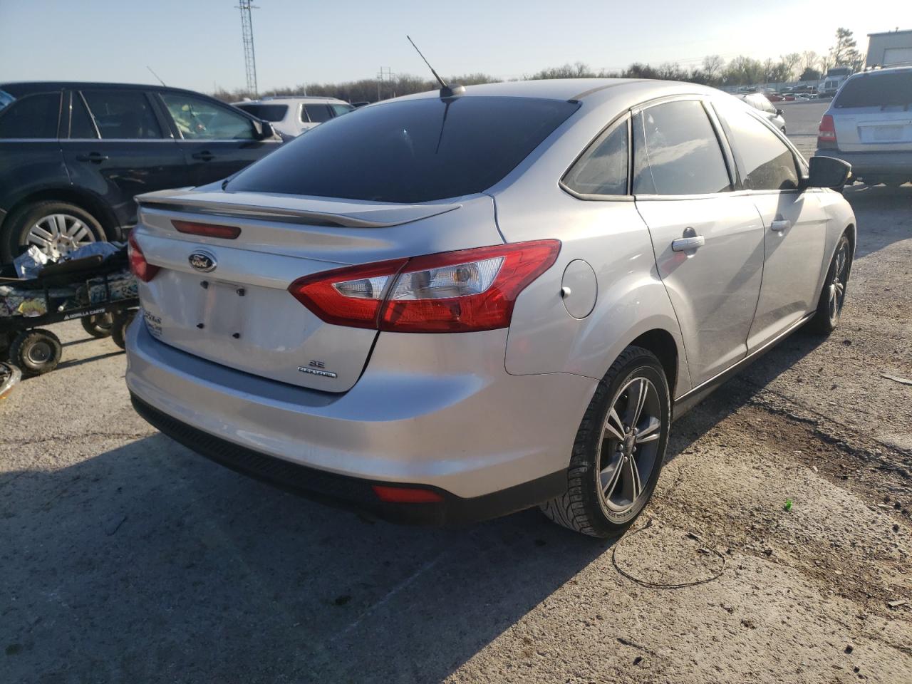 Photo 4 from auction – 2014 FORD FOCUS SE with VIN 1FADP3F29EL340735
