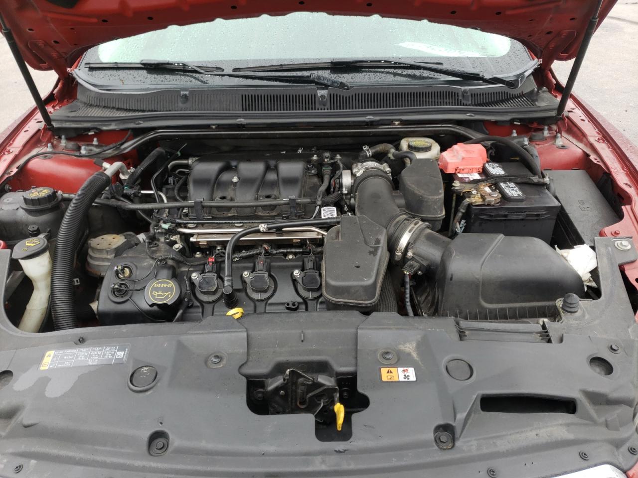 Photo 7 from auction – 2014 FORD TAURUS SEL with VIN 1FAHP2E81EG180084