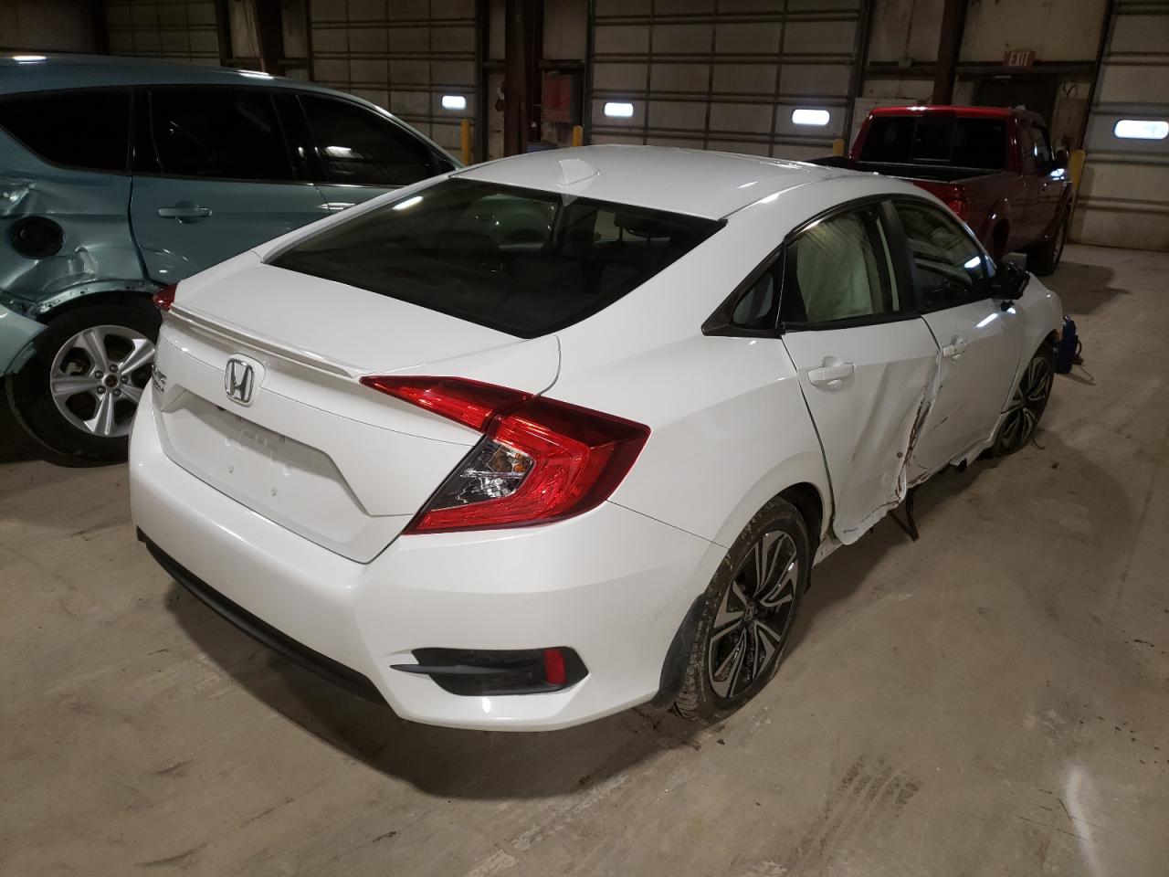 Photo 4 from auction – 2018 HONDA CIVIC EX with VIN JHMFC1F3XJX027481