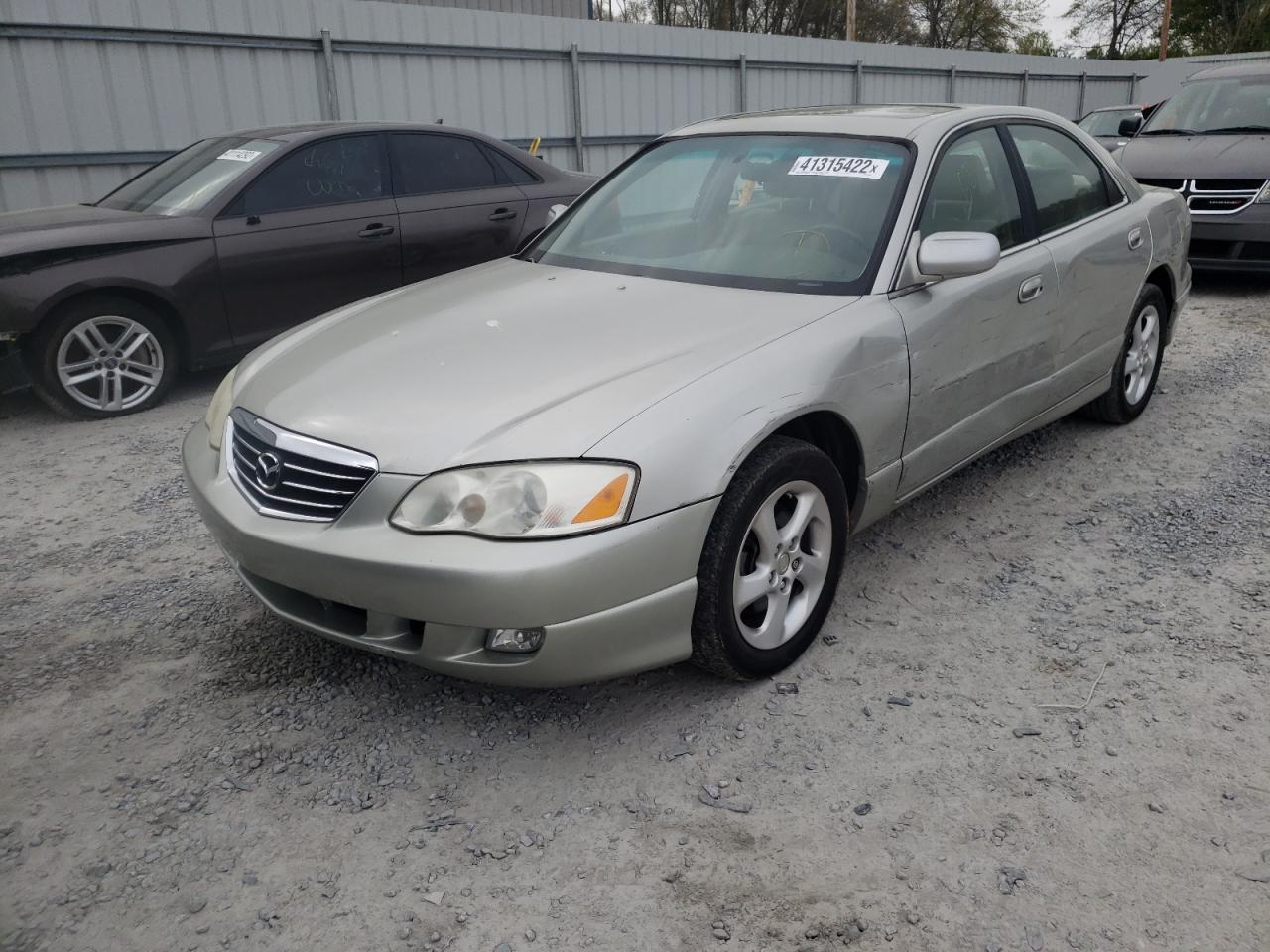 Photo 2 from auction – 2002 MAZDA MILLENIA with VIN JM1TA221221736494