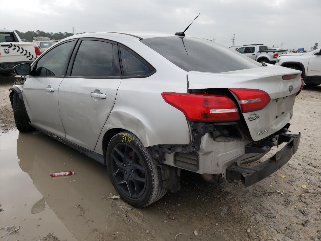 Photo 3 from auction – 2016 FORD FOCUS SE with VIN 1FADP3F27GL311883