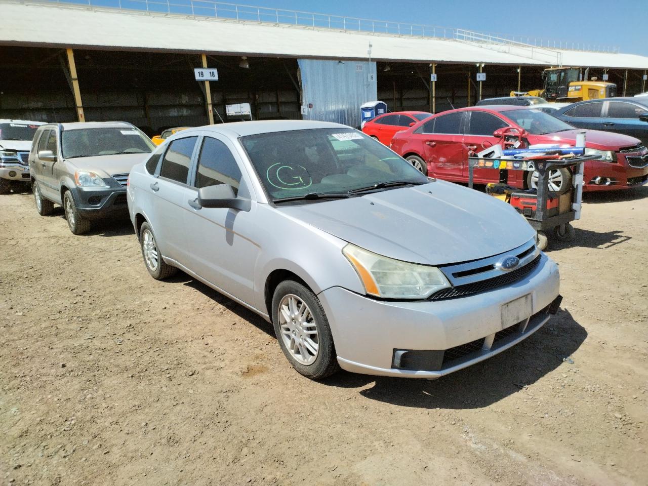 FORD FOCUS SE 2010 with VIN 1FAHP3FN6AW226972 - Photo from auction