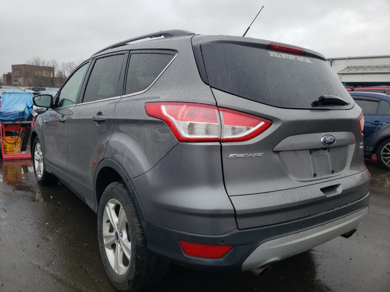 Photo 3 from auction – 2014 FORD ESCAPE SE with VIN 1FMCU9GX5EUB91399