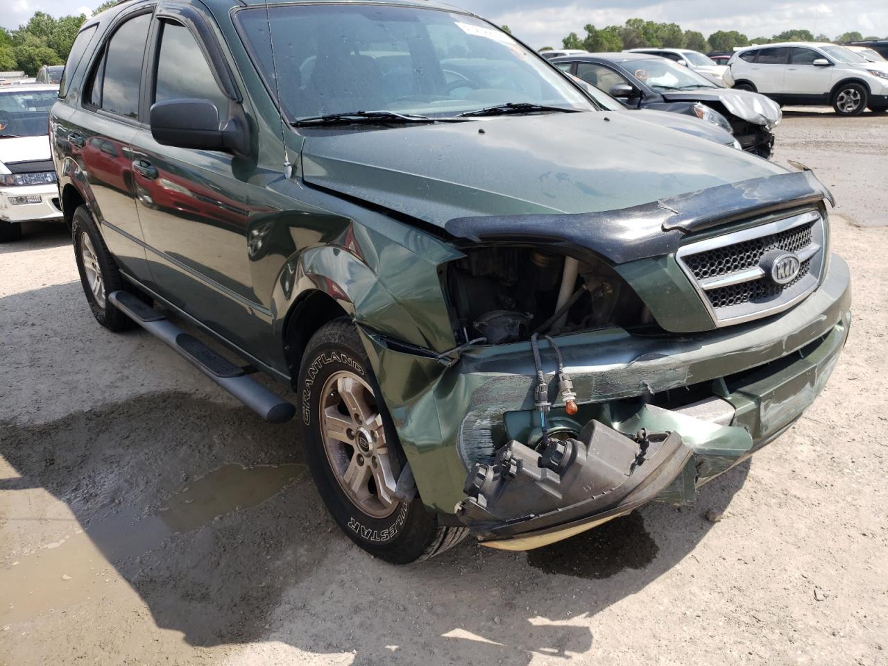 Photo 9 from auction – 2005 KIA SORENTO EX with VIN KNDJD733455338745