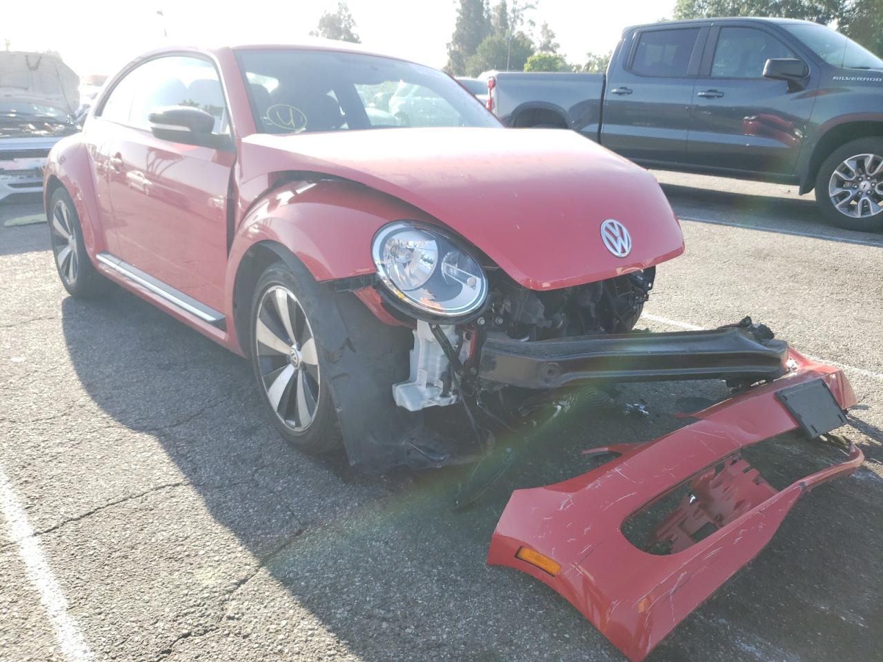VOLKSWAGEN BEETLE TUR 2013 with VIN 3VWVA7AT2DM634057 - Photo from auction