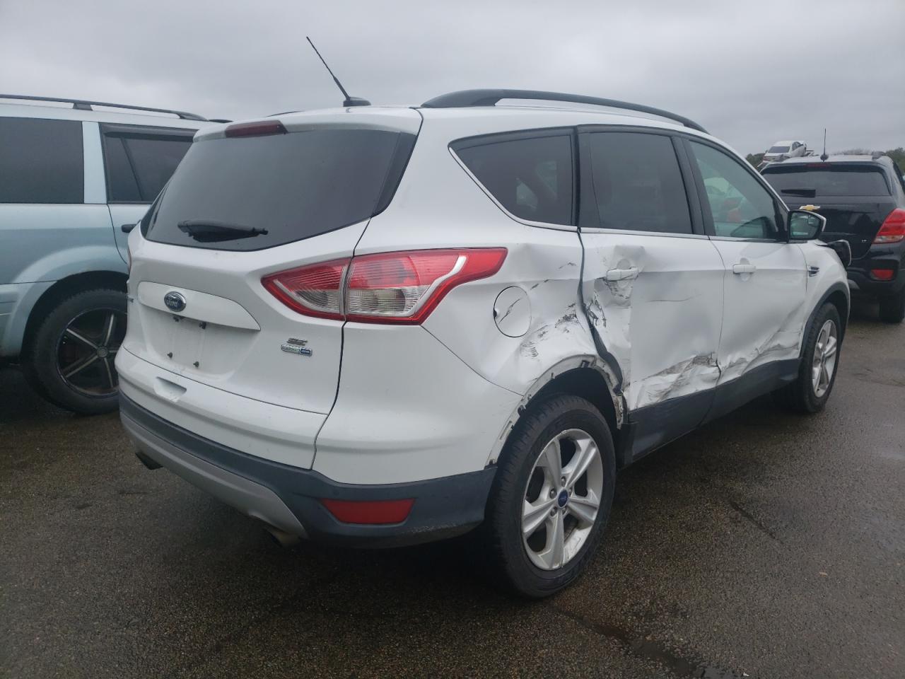 Photo 4 from auction – 2016 FORD ESCAPE SE with VIN 1FMCU9GX1GUA58688