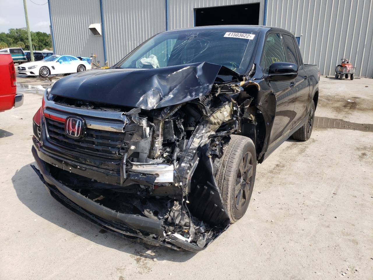 Photo 2 from auction – 2020 HONDA RIDGELINE with VIN 5FPYK3F82LB013650