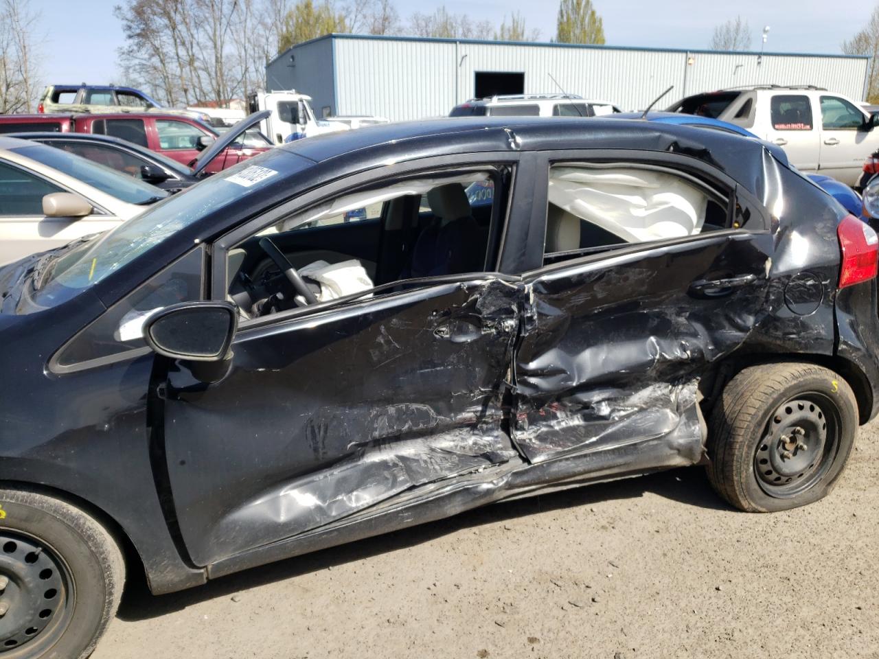Photo 9 from auction – 2012 KIA RIO LX with VIN KNADM5A34C6016924