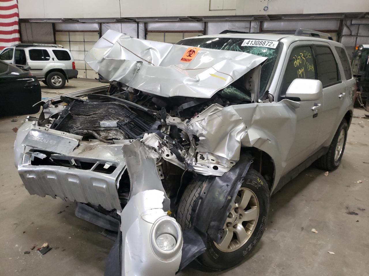 Photo 2 from auction – 2010 FORD ESCAPE LIM with VIN 1FMCU9EG5AKC77952