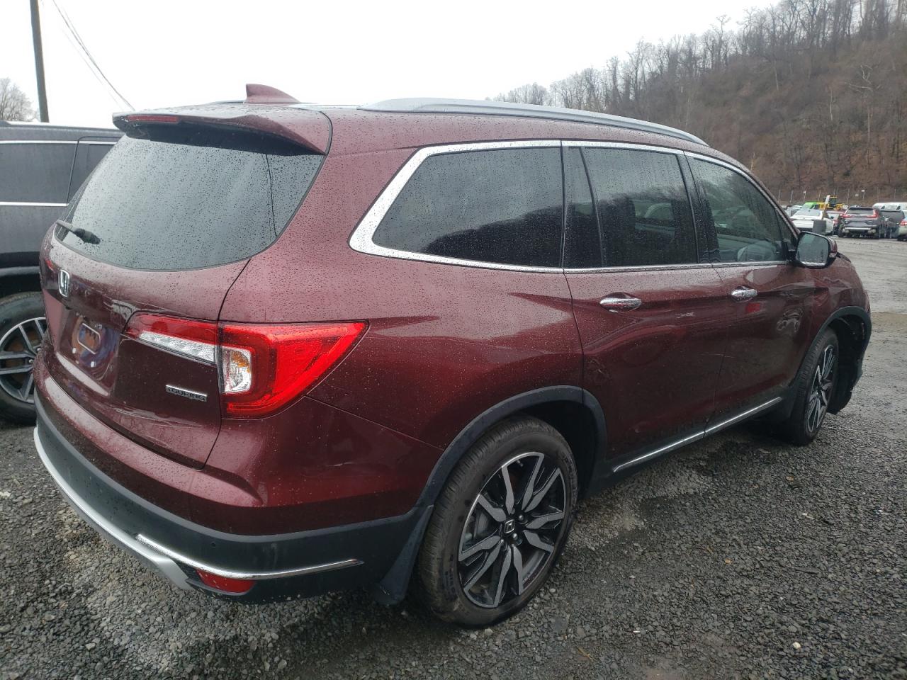 Photo 4 from auction – 2021 HONDA PILOT TOUR with VIN 5FNYF5H97MB020318