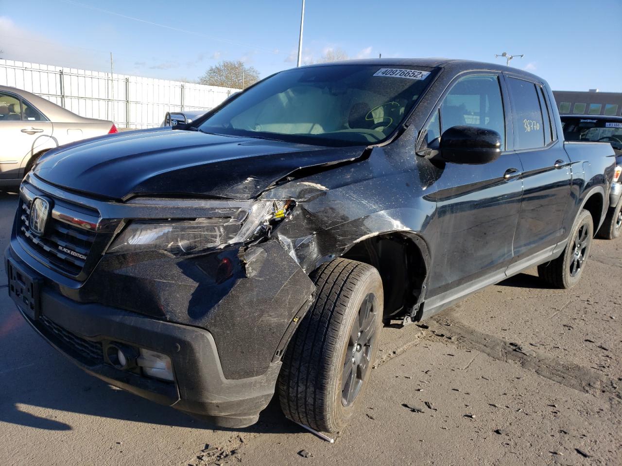 Photo 2 from auction – 2019 HONDA RIDGELINE with VIN 5FPYK3F84KB023501
