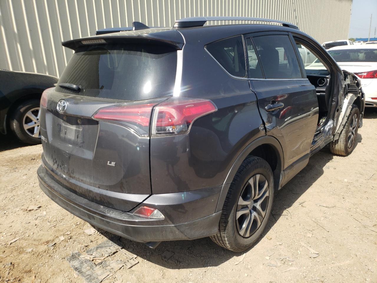 Photo 4 from auction – 2018 TOYOTA RAV4 LE with VIN JTMZFREV7JJ181835