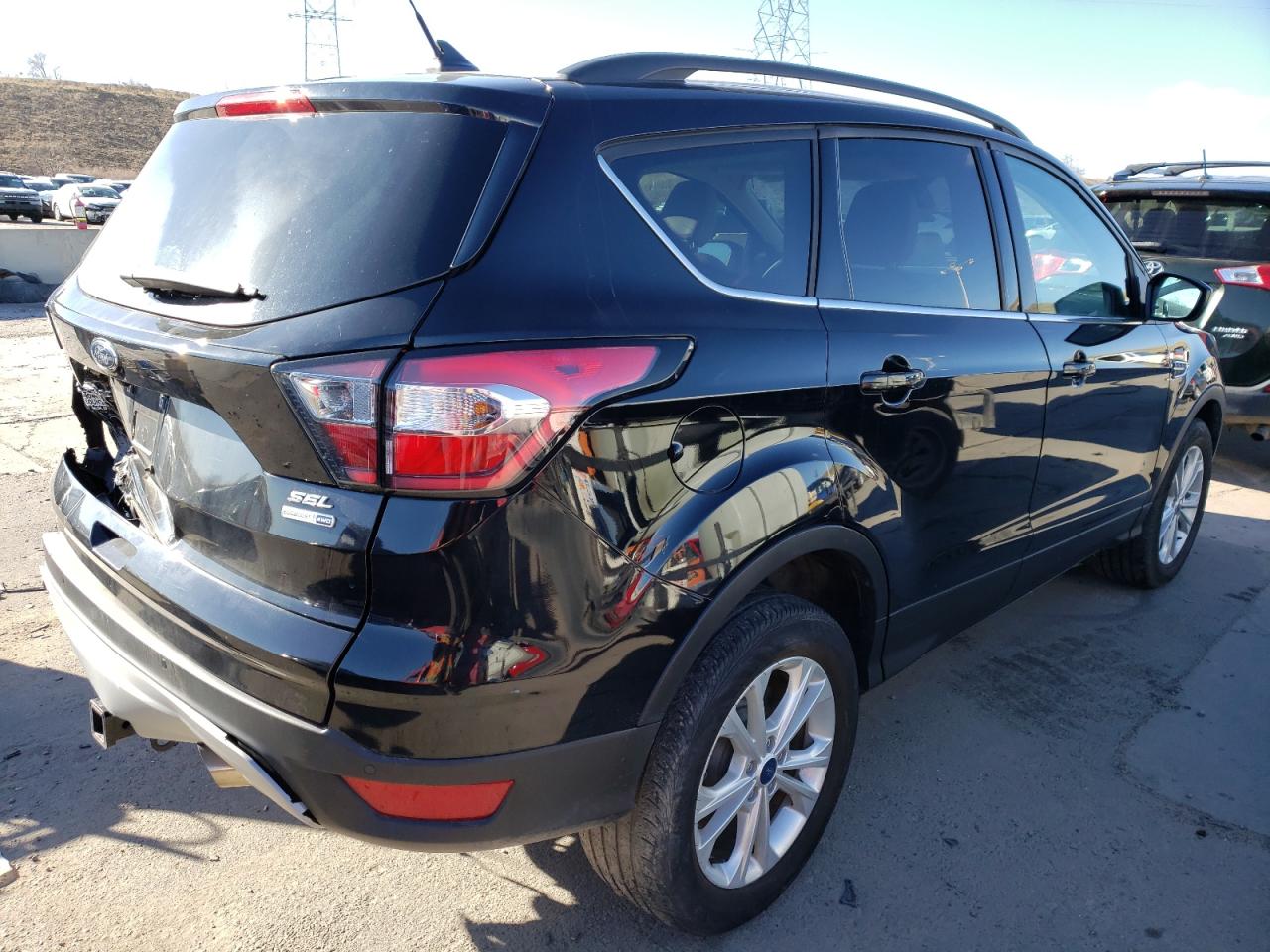 Photo 4 from auction – 2018 FORD ESCAPE SEL with VIN 1FMCU9HDXJUB83863