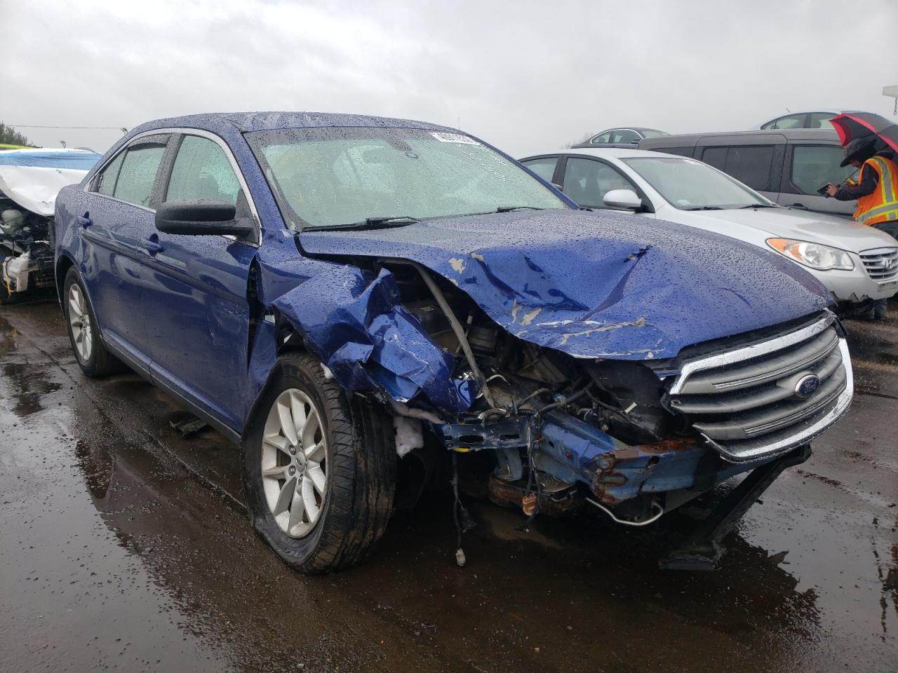 FORD TAURUS SE 2015 with VIN 1FAHP2D89FG112778 - Photo from auction