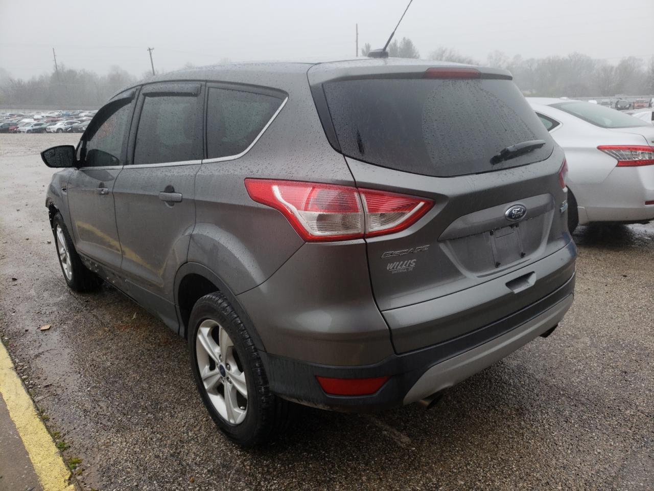 Photo 3 from auction – 2014 FORD ESCAPE SE with VIN 1FMCU0GXXEUB36930