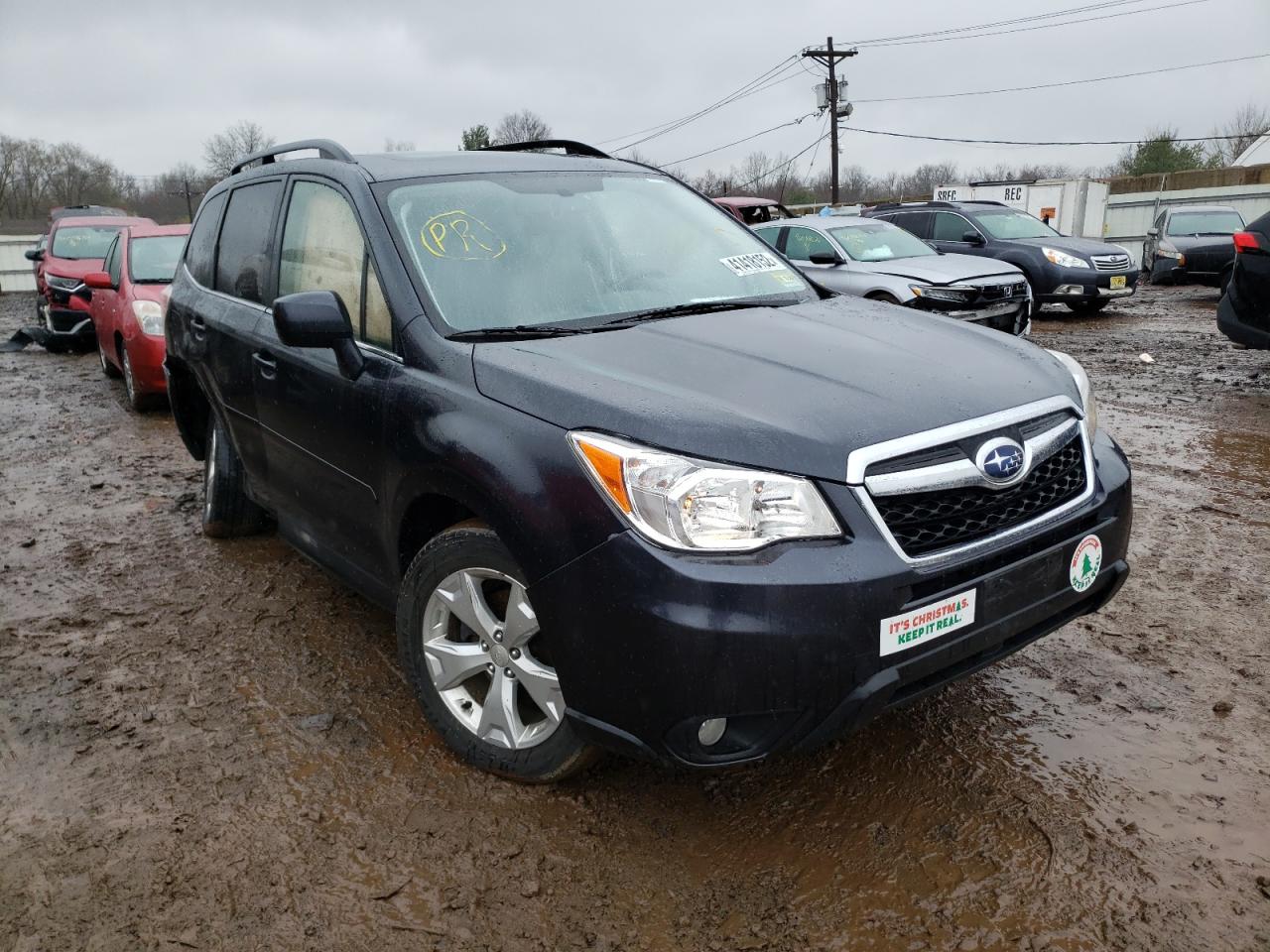 SUBARU FORESTER 2 2014 with VIN JF2SJAJC2EH409535 - Photo from auction