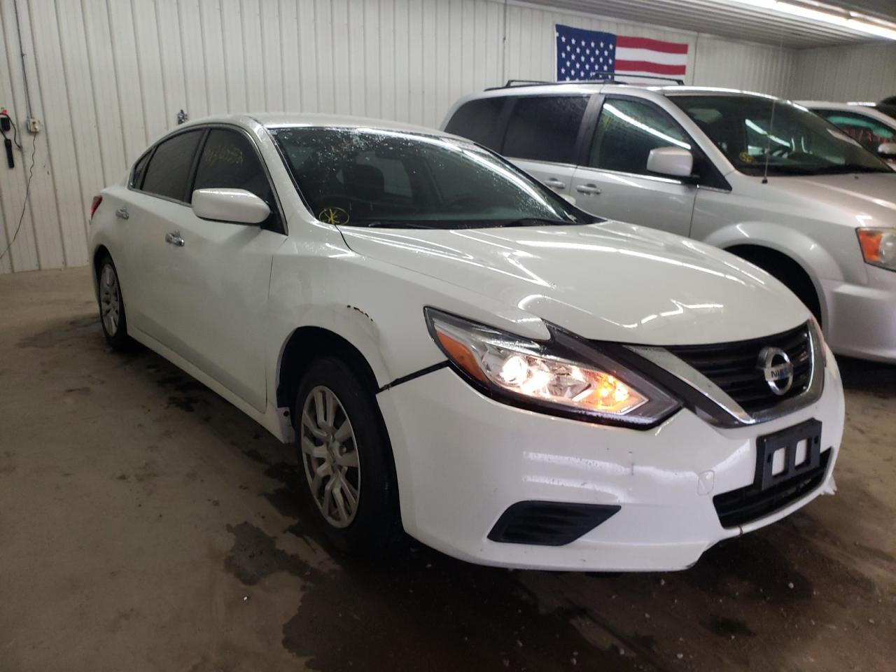 NISSAN ALTIMA 2.5 2016 with VIN 1N4AL3AP0GN353088 - Photo from auction