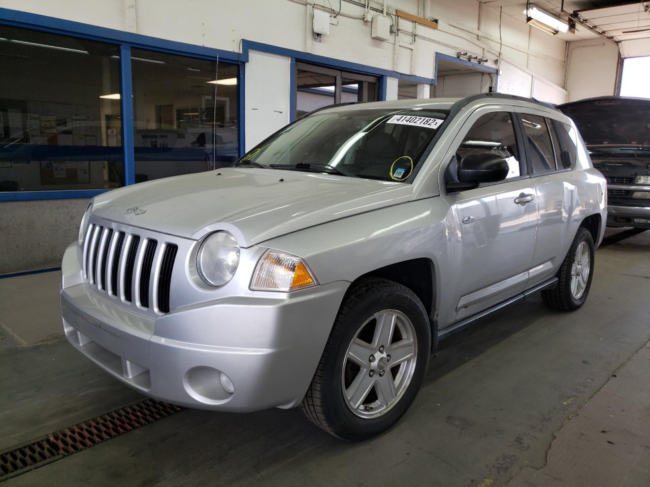 Photo 2 from auction – 2010 JEEP COMPASS SP with VIN 1J4NF4FB4AD564498