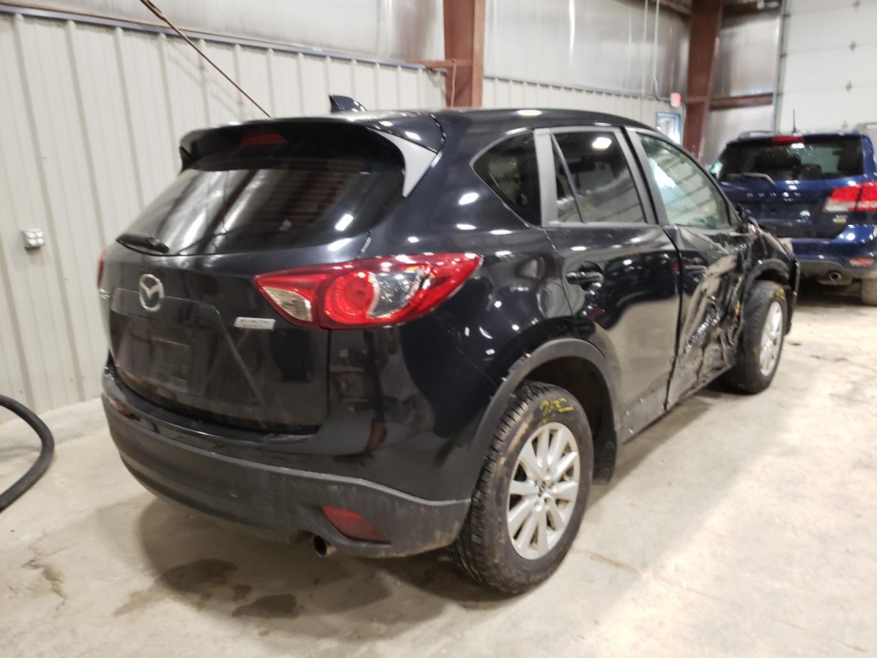 Photo 4 from auction – 2013 MAZDA CX-5 SPORT with VIN JM3KE2BE1D0135631