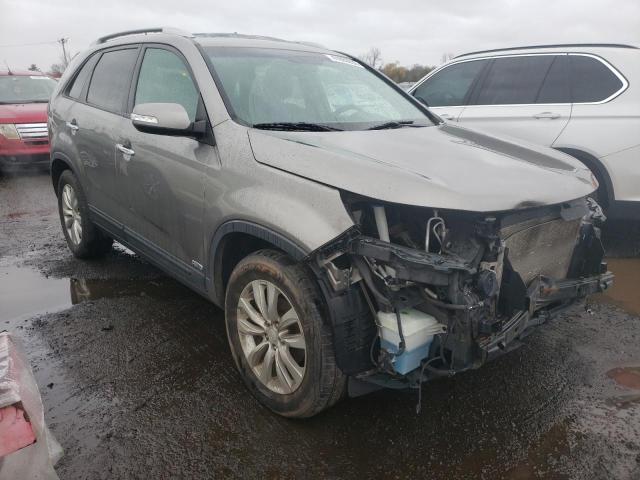 KIA SORENTO EX 2011 with VIN 5XYKUDA2XBG080585 - Photo from auction