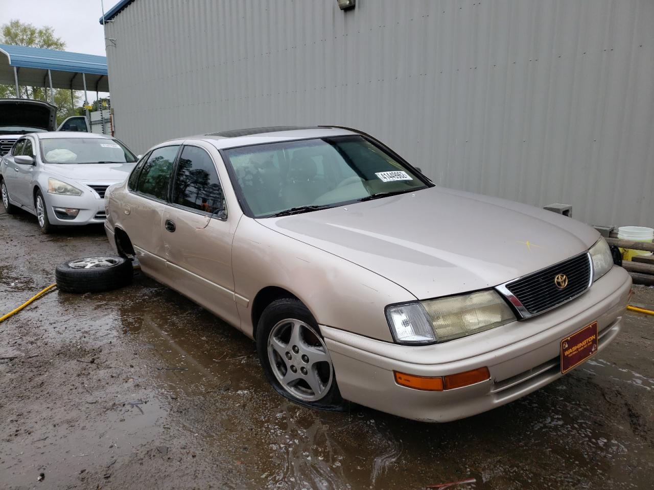 TOYOTA AVALON 1997 with VIN 4T1BF12B3VU194840 - Photo from auction