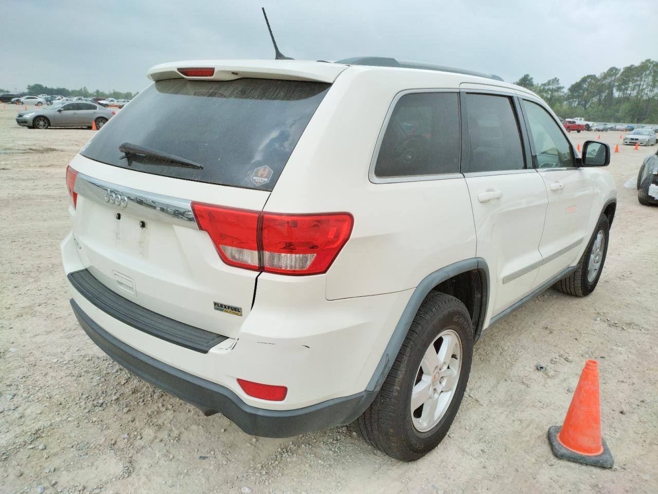 Photo 4 from auction – 2011 JEEP GRAND CHER with VIN 1J4RS4GG9BC658259