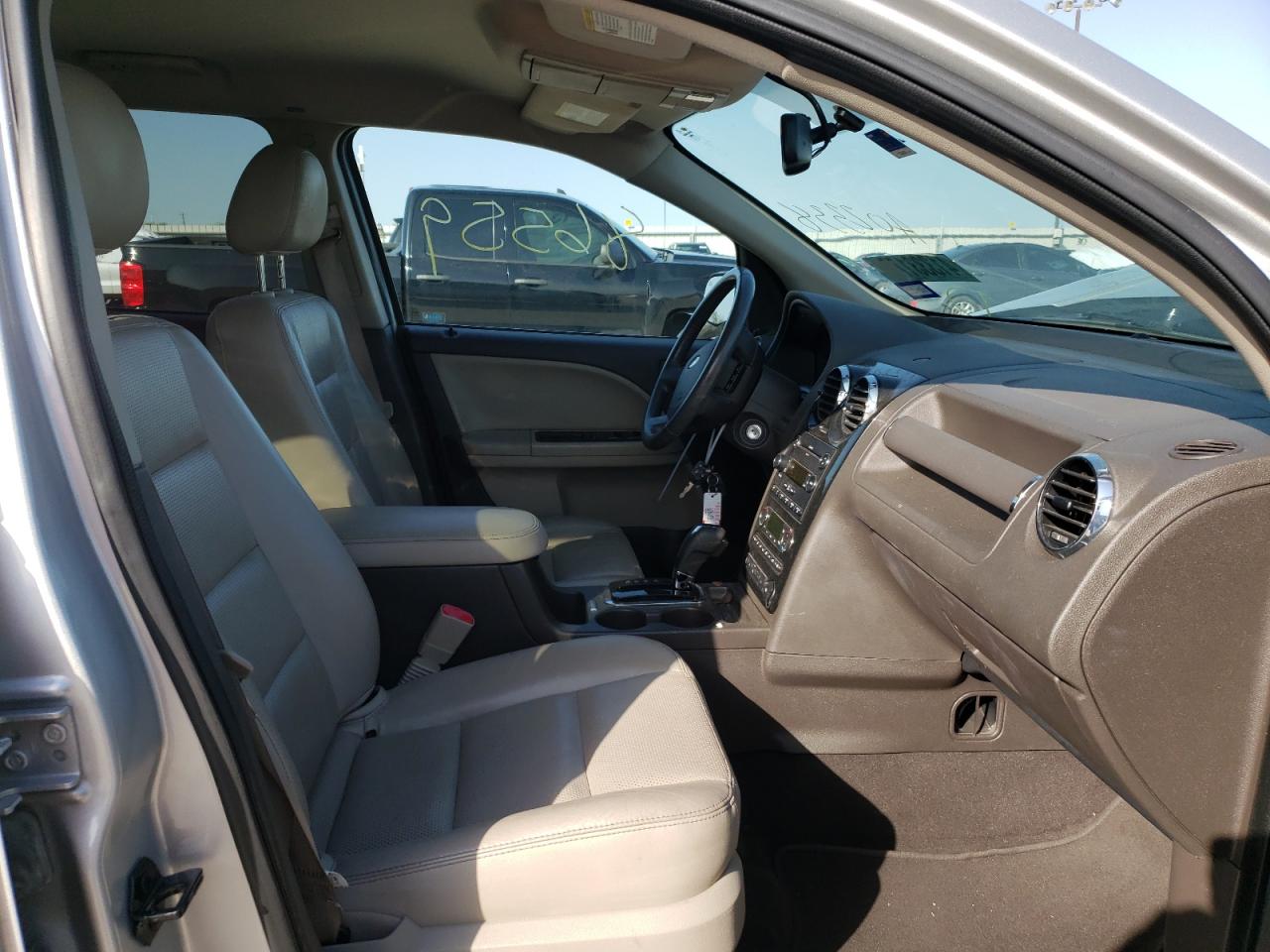 Photo 5 from auction – 2009 FORD TAURUS X S with VIN 1FMDK02W59GA02338