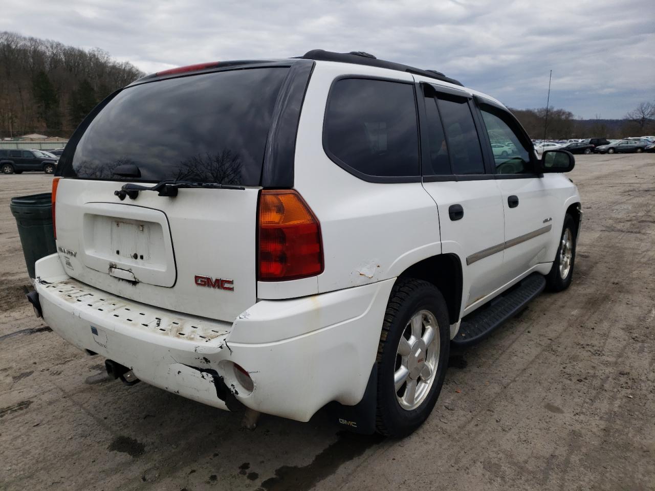 Photo 4 from auction – 2006 GMC ENVOY with VIN 1GKDT13SX62256823