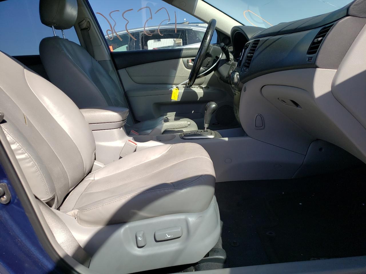 Photo 5 from auction – 2007 KIA OPTIMA LX with VIN KNAGE124475129813