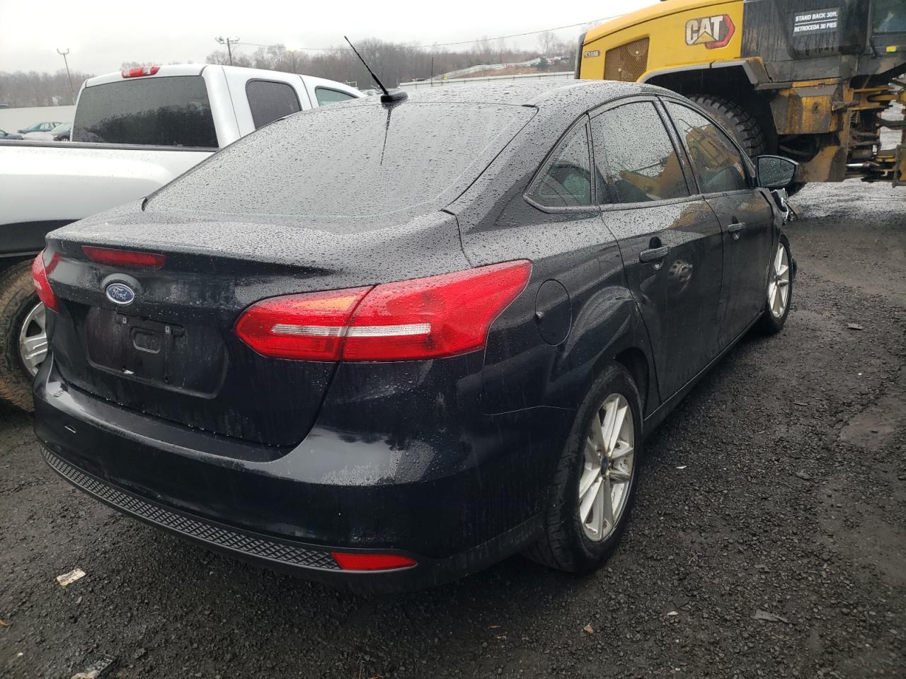 Photo 4 from auction – 2018 FORD FOCUS SE with VIN 1FADP3F21JL315113