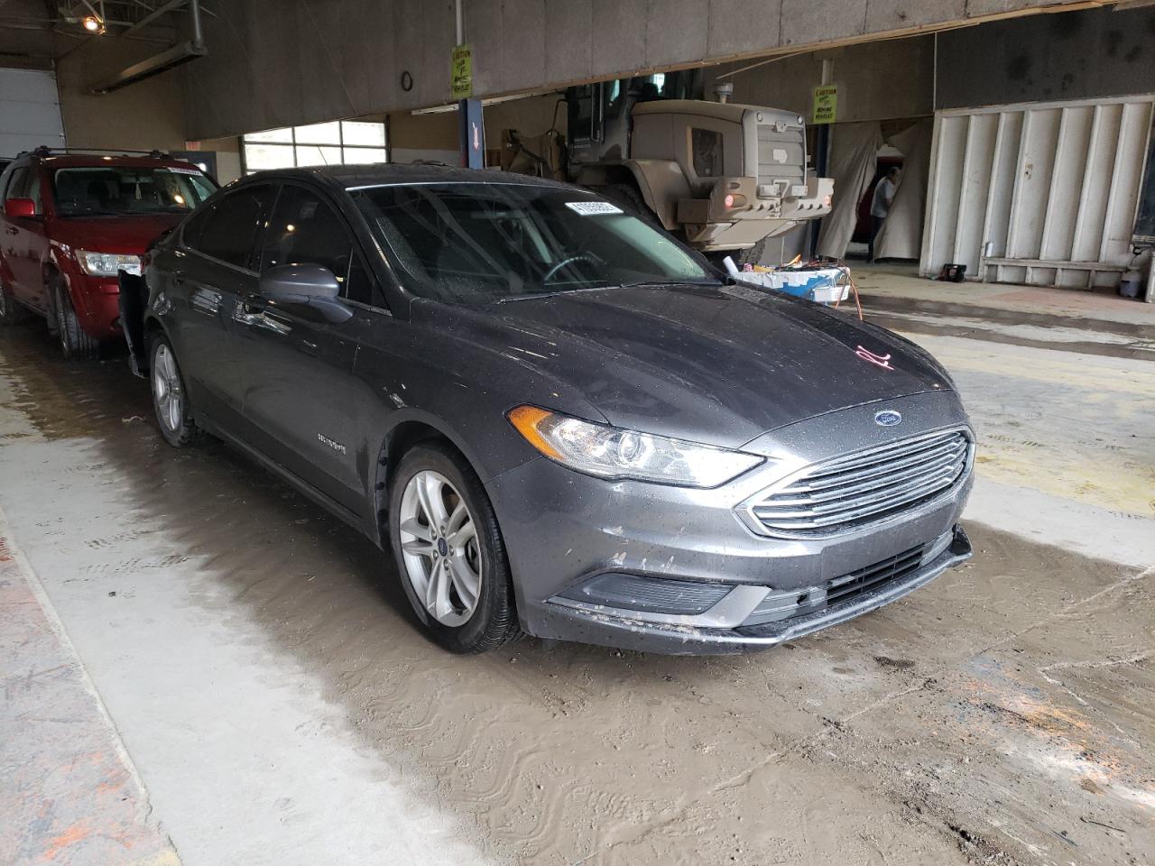 FORD FUSION SE 2018 with VIN 3FA6P0LU1JR210649 - Photo from auction