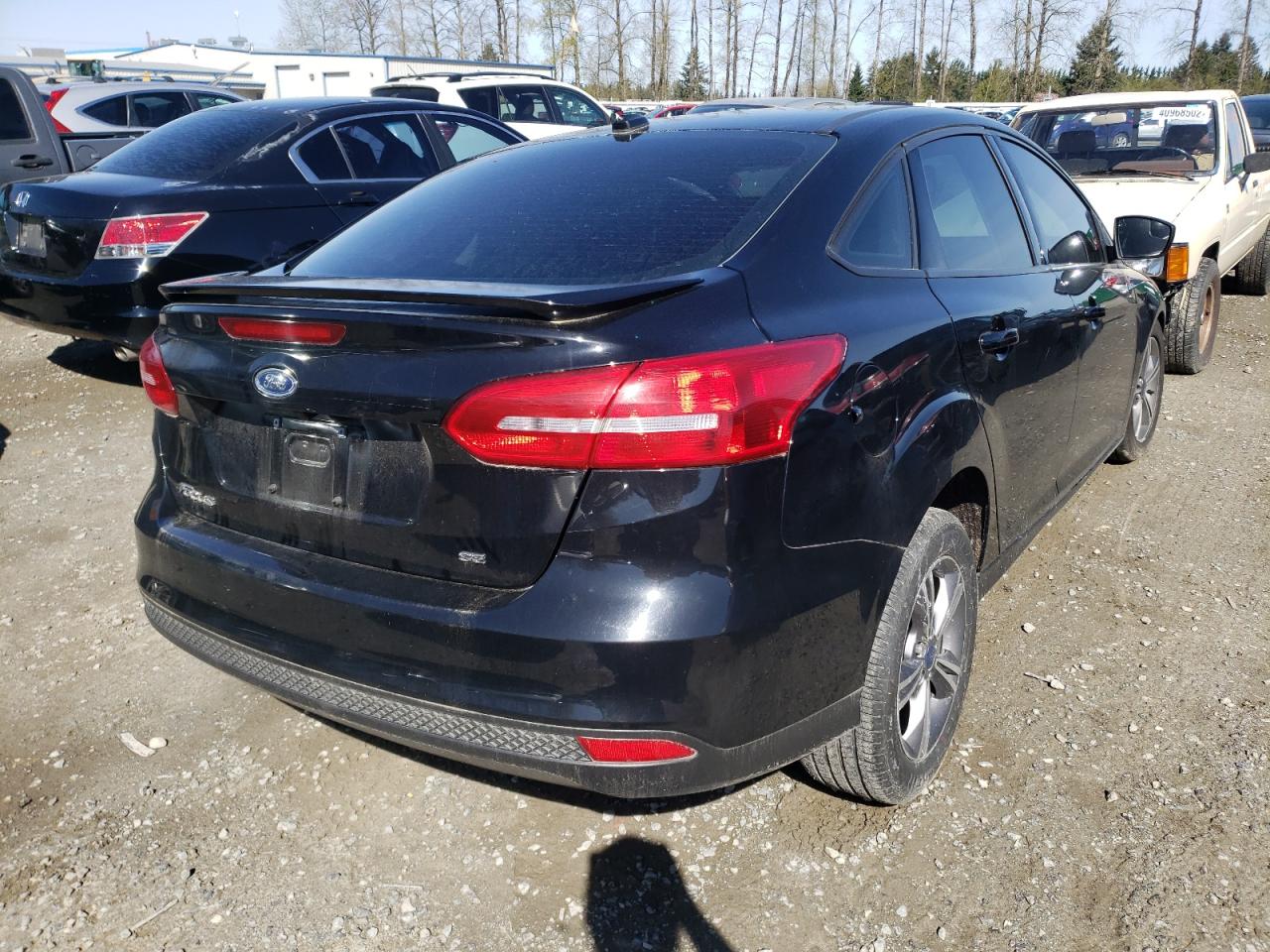 Photo 4 from auction – 2018 FORD FOCUS SE with VIN 1FADP3F25JL224751