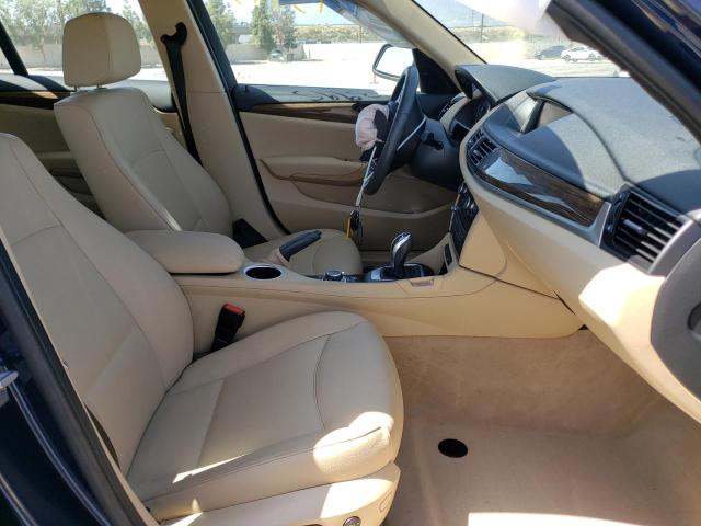 Photo 5 from auction – 2015 BMW X1 SDRIVE2 with VIN WBAVM1C51FV497897