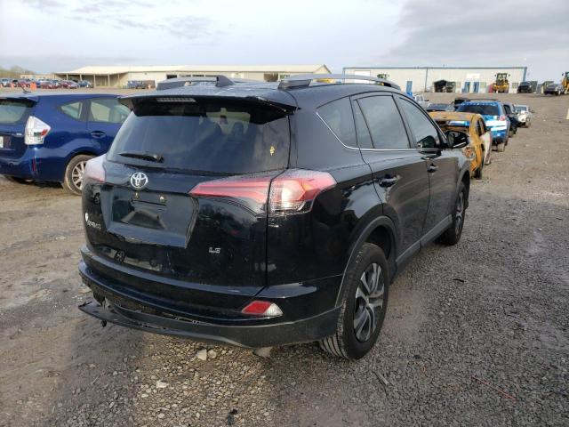 Photo 4 from auction – 2018 TOYOTA RAV4 LE with VIN 2T3ZFREVXJW498381