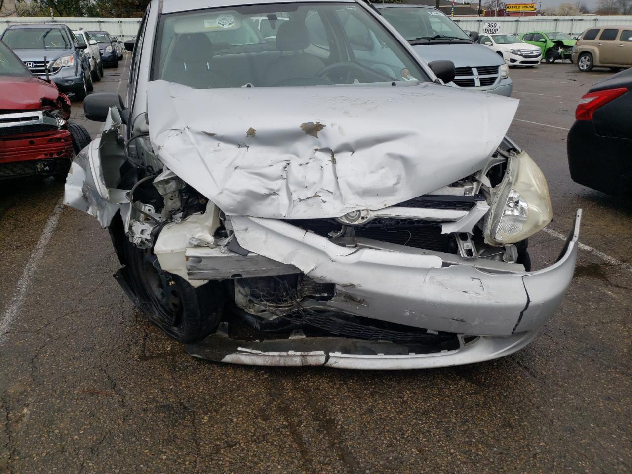 Photo 9 from auction – 2004 TOYOTA ECHO with VIN JTDAT123840328748