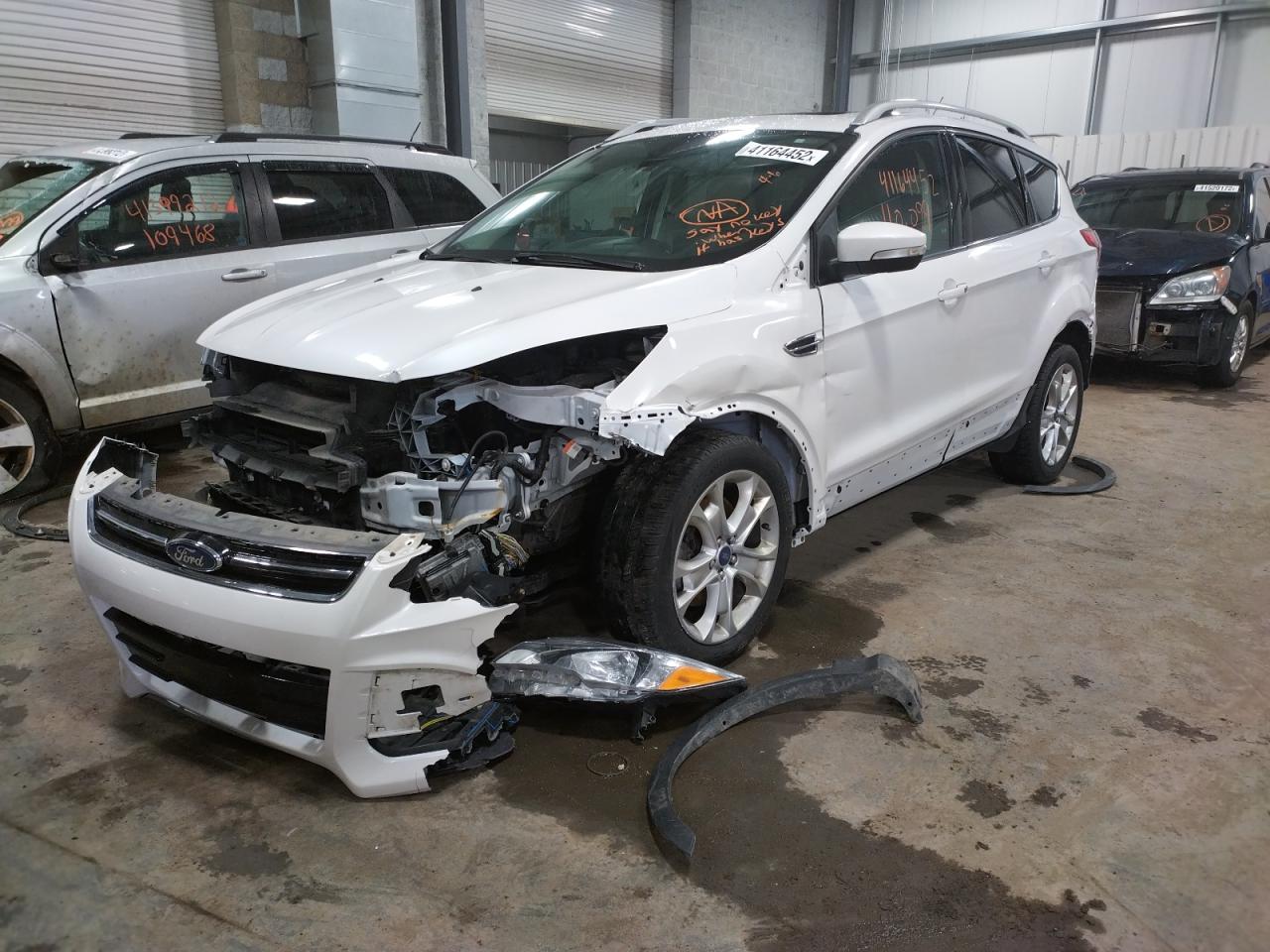 Photo 2 from auction – 2015 FORD ESCAPE TIT with VIN 1FMCU9JX5FUC57587