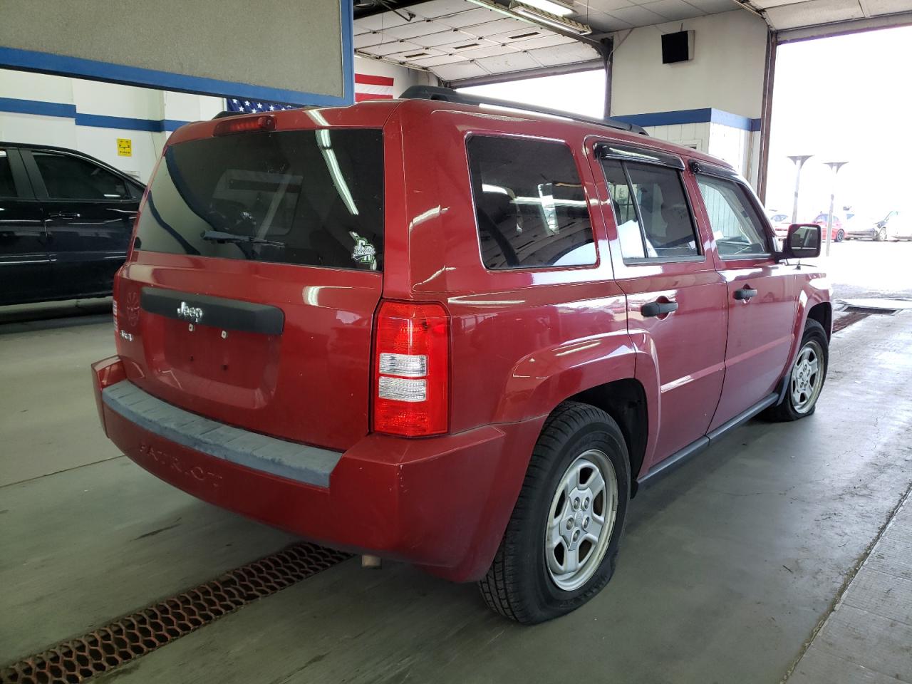 Photo 4 from auction – 2009 JEEP PATRIOT SP with VIN 1J4FF28B79D145871